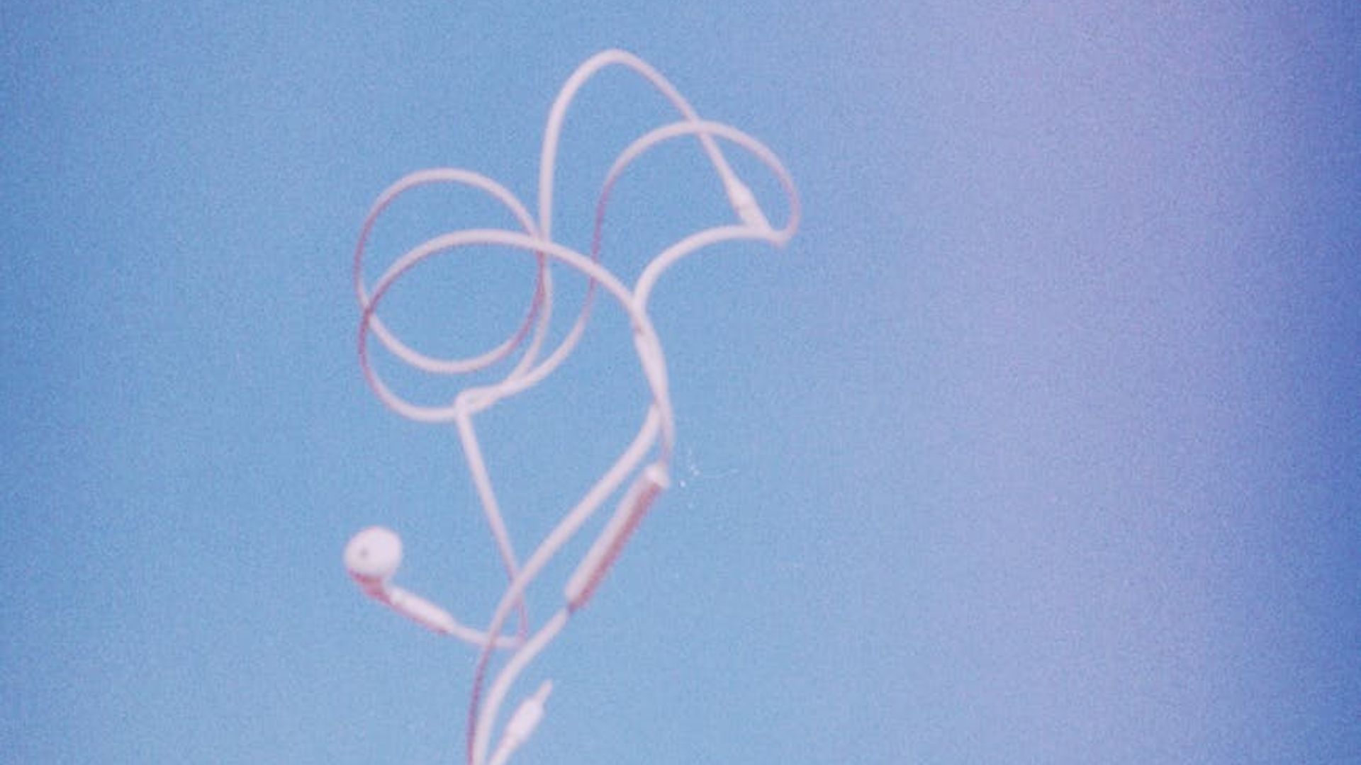 Dark, open space for movement with subtle light.